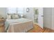 Bright bedroom with a peak into an en-suite bathroom at 2835 3Rd N Ave, St Petersburg, FL 33713