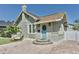 Close up of a charming bungalow-style home with a brick driveway and light blue front door with wreath at 2835 3Rd N Ave, St Petersburg, FL 33713