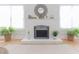 Elegant fireplace with a decorative mantel, complemented by hardwood floors and natural light at 2835 3Rd N Ave, St Petersburg, FL 33713