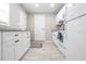 Clean, white kitchen with stainless steel appliances and ample cabinet space at 2835 3Rd N Ave, St Petersburg, FL 33713