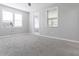 Bright living room featuring neutral walls, modern windows, and plush carpeting at 2835 3Rd N Ave, St Petersburg, FL 33713