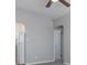 Living room with an open floor plan featuring fresh paint, a ceiling fan, and access to the kitchen at 2835 3Rd N Ave, St Petersburg, FL 33713