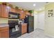 Bright kitchen with tile flooring, stainless steel appliances, and lots of cabinet space at 3002 Mojave Oak Dr, Valrico, FL 33594