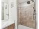 Shower featuring tile and black rainfall shower head in bathroom at 3002 Mojave Oak Dr, Valrico, FL 33594