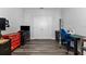 Versatile room with hardwood floors, ideal for an office or hobby space, with ample storage at 34244 Radley Way, Wesley Chapel, FL 33545