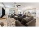 Spacious living room with open layout flows into the kitchen, providing lots of space and natural light at 34311 Evergreen Hill Ct, Wesley Chapel, FL 33545