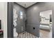 The bathroom features an enclosed shower, a toilet, and a towel rack at 3635 80Th E Dr, Sarasota, FL 34243