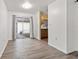 Dining area featuring a view of the back yard through a sliding glass door at 3684 14Th Se Ave, Largo, FL 33771
