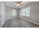 Well-lit bedroom featuring neutral colors, ample natural light and hardwood flooring at 3714 38Th N Ave, St Petersburg, FL 33713