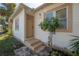 A cozy home entrance with fresh paint and landscaping around the front door at 3714 38Th N Ave, St Petersburg, FL 33713
