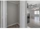 A view of a coat closet along a hallway leading into the kitchen and living areas at 3714 38Th N Ave, St Petersburg, FL 33713