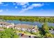 Aerial view of the community with lake views, lush landscaping, and convenient parking at 435 Kensington Lake Crk, Brandon, FL 33511