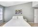 This bedroom has light walls, a small night stand and modern decor at 435 Kensington Lake Crk, Brandon, FL 33511