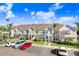 Well-maintained townhouse complex with ample parking, lush landscaping, and a serene residential setting at 435 Kensington Lake Crk, Brandon, FL 33511