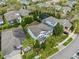 Aerial view of two-story home shows neighborhood, landscaping, and nearby sidewalks at 5305 Sagecrest Dr, Lithia, FL 33547