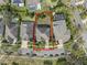 Aerial view of property shows landscaping, backyard, mature trees and neighborhood at 5305 Sagecrest Dr, Lithia, FL 33547