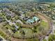 A beautiful aerial view shows the neighborhood pool and amenities at 5305 Sagecrest Dr, Lithia, FL 33547