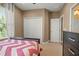 Bedroom with a closet, neutral walls, ceiling fan, and natural light from the window at 5305 Sagecrest Dr, Lithia, FL 33547