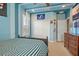 Stylized bedroom with bed, ceiling fan, carpeting and wall decorations creating a distinctive look at 5305 Sagecrest Dr, Lithia, FL 33547