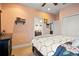 Comfortable bedroom with connecting door, closet and peach-colored walls at 5305 Sagecrest Dr, Lithia, FL 33547