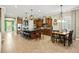 Expansive kitchen with island seating that connects to the dining and living areas at 5305 Sagecrest Dr, Lithia, FL 33547