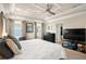 Spacious main bedroom with a tray ceiling, and walk-in closet at 5305 Sagecrest Dr, Lithia, FL 33547