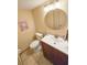 Comfortable half-bath with neutral walls and decorative accents at 6020 Shore S Blvd # 1009, Gulfport, FL 33707
