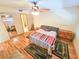 Bedroom with a bed, two night stands and a mirror at 6020 Shore S Blvd # 1009, Gulfport, FL 33707