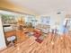 Inviting living room featuring wood floors, comfortable seating, and scenic views at 6020 Shore S Blvd # 1009, Gulfport, FL 33707