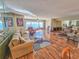 Spacious living room featuring wood floors, comfortable seating, and scenic views at 6020 Shore S Blvd # 1009, Gulfport, FL 33707