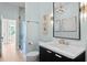 Bathroom featuring a modern vanity with marble countertop and glass walk-in shower at 708 Islebay Dr, Apollo Beach, FL 33572