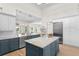 Gourmet kitchen with Viking stainless steel refrigerator and views to the formal living room at 708 Islebay Dr, Apollo Beach, FL 33572