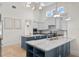 Spacious kitchen with custom cabinetry, marble countertops, and modern appliances at 708 Islebay Dr, Apollo Beach, FL 33572