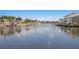 Wide angle of a canal lined with boat docks for avid boaters in a waterfront community at 708 Islebay Dr, Apollo Beach, FL 33572