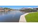 A waterfront canal lined with boats and docks in a quiet, residential neighborhood at 708 Islebay Dr, Apollo Beach, FL 33572