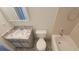 Bathroom with patterned tile flooring, a vanity with a marble-style top and a shower-tub combo at 7502 Bolanos Ct, Tampa, FL 33615