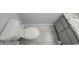 Bathroom showcasing a modern toilet and updated vanity with stylish countertop at 7502 Bolanos Ct, Tampa, FL 33615
