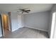 A serene bedroom showcasing neutral colors and wood-look flooring at 7502 Bolanos Ct, Tampa, FL 33615