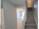 Welcoming foyer with staircase and open sightlines into the adjacent rooms at 7502 Bolanos Ct, Tampa, FL 33615