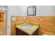 Bathroom featuring granite countertop, tiled backsplash, and a traditional vanity with brushed nickel faucet at 7512 Dolonita Dr # 7512, Tampa, FL 33615