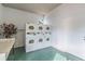 Bright laundry room with six coin operated washing machines and a small window for natural light at 7512 Dolonita Dr # 7512, Tampa, FL 33615