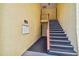 Condo stairwell with mailboxes, and outside entrance to units on second floor at 7512 Dolonita Dr # 7512, Tampa, FL 33615