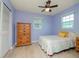 Charming bedroom featuring a ceiling fan and natural light, creating a relaxing atmosphere at 7755 39Th N Ave, St Petersburg, FL 33709
