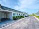 A clean exterior view showcasing a well-maintained building with lush landscaping, offering a tranquil and inviting atmosphere at 7755 39Th N Ave, St Petersburg, FL 33709