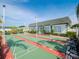 Recreational shuffleboard courts offer outdoor fun with meticulously maintained landscaping and surrounding amenities at 7755 39Th N Ave, St Petersburg, FL 33709