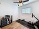 Bedroom featuring a ceiling fan, a window, and a modern exercise machine at 777 62Nd N Ave, St Petersburg, FL 33702