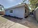 This is a view of the exterior of the home, highlighting a small garden bed and walkway at 777 62Nd N Ave, St Petersburg, FL 33702