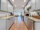 Well-lit kitchen with sleek appliances, stylish backsplash, and an inviting, open layout at 777 62Nd N Ave, St Petersburg, FL 33702