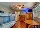 Bedroom with bunk beds, desk, and storage dresser, providing ample space at 8740 Forest Lake Dr, Port Richey, FL 34668