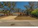Well maintained single story home with mature trees, an attached two car garage, and lovely landscaping at 8740 Forest Lake Dr, Port Richey, FL 34668